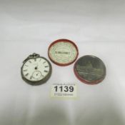 A silver pocket watch a/f and a medallion for the Universal Exhibition of London 1862