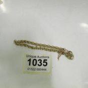A 9ct yellow gold heart locket bracelet