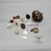 A shell purse, assorted mother of pearl counters and a small brass manicure item