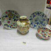 2 early Oriental plates, a Japanese vase and an Oriental bowl