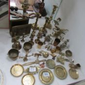 A large quantity of brass ware including Dragon candlestick