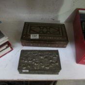 An inlaid box and an embossed metal box