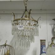 A small 3 tier chandelier
