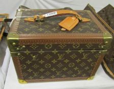 A Louis Vuitton 'Flacon Boate' travel case (key in office)
