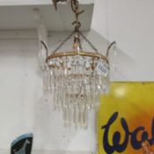 A small three tier chandelier