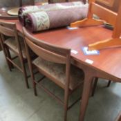 A Macintosh table and 4 chairs