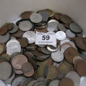 A quantity of mixed English and foreign coins and tokens