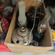 A box of old oil lamps including Alladin etc