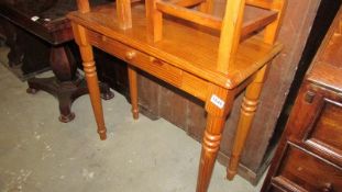A pine single drawer hall table