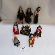 8 vintage costume dolls