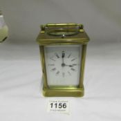 A Victorian brass repeater carraige clock (needs slight attention)