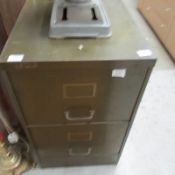A 2 drawer metal filing cabinet