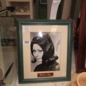 A signed photograph aod Sophia Loren