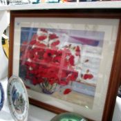 A watercolour of vase of poppies