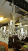 A glass 9 light chandelier