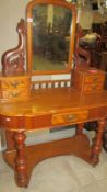 A pale mahogany duchy style dressing table