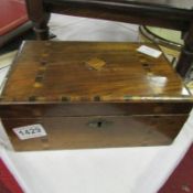 A mahogany inlaid box