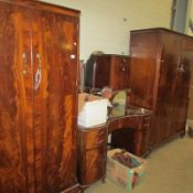 A retro bedroom suite comprising 2 wardrobes and dressing table