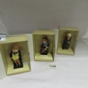 3 boxed Royal Doulton Dicken's figures being Tiny Tim, Scrooge and Macawber