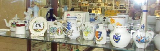 A mixed lot including crested ware