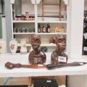 2 carved wood African busts and 2 carved wooden knives