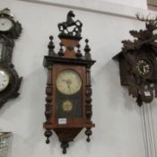 An old mahogany wall clock