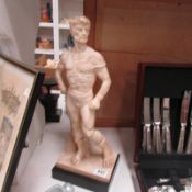 An Alabaster figure of a Roman Gladiator signed A Santini