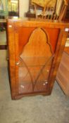 An Art Deco style china cabinet