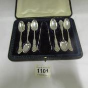 A cased set of silver teaspoons with sugar tongs, HM for Chester, maker James Deakin & Sons