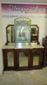 A Victorian inlaid walnut credenza with marble top and mirror back