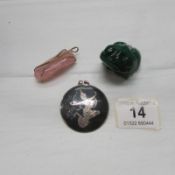 A pink quartz pendant, a Siamese silver pendant and a malacite frog