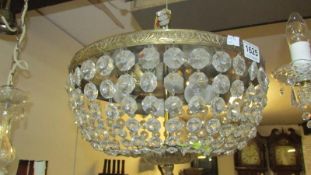 A glass and metal 'basket' chandelier