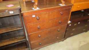 A 4 drawer oak chest