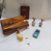 A musical jewellery box, Corgi Lotus car, pair of miniature Limoges vases , ivory elephant,