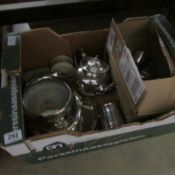 A large box of silver plated items