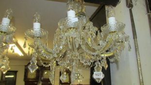 An 8 light crystal chandelier