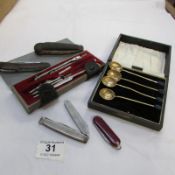 A Hellerman Geometry set, penknives, Art Deco style spoons etc