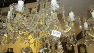 An 8 light crystal chandelier