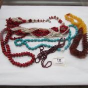 5 assorted necklaces including pearls and turquoise