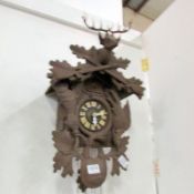 An unusual style Black Forest double cuckoo clock