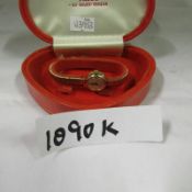 A 9ct gold Tudor Rolex ladies wrist watch with 9ct gold strap and in original box