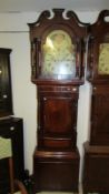 A mahogany cased Grandfather clock with 8 day movement, painted dial and moon phase