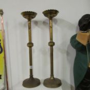 A pair of 19th century brass church candlesticks