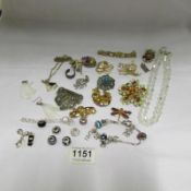 A mixed lot of jewellery including Pandora, brooches etc