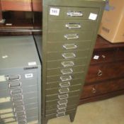 A metal 15 drawer cabinet