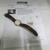 A Tissot Ballade automatic wrist watch with 2003 insurance certificate
