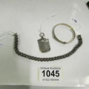 A silver child's bracelet, silver wrist chain and a silver watch fob HM Birmingham 1919/20