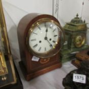 An Edwardian inlaid mantel clock