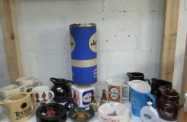 A mixed lot of Wade advertising water jugs, ashtrays and a Wade Jubilee stout motion lamp