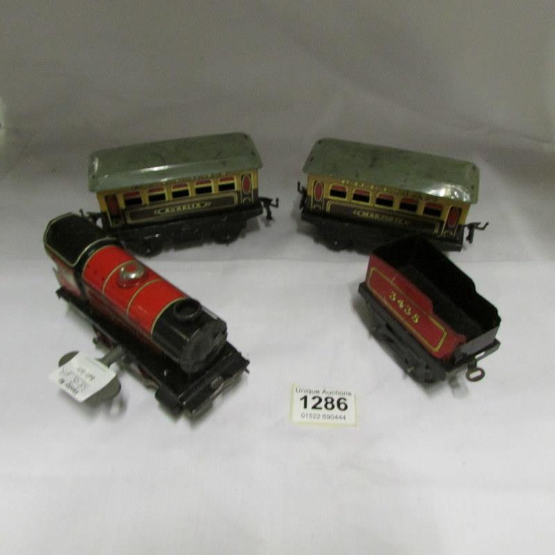 A Hornby '0' gauge tinplate train, tender and carriages